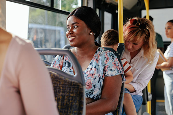 Young black woman in public transport